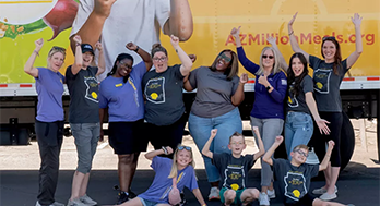 group photo volunteering and cheering