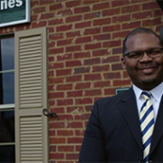 Financial Advisor Thomas Scott standing in front of Edward Jones Branch Office