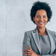 Confident business woman smiling.