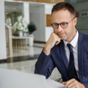 Man looking at his laptop.