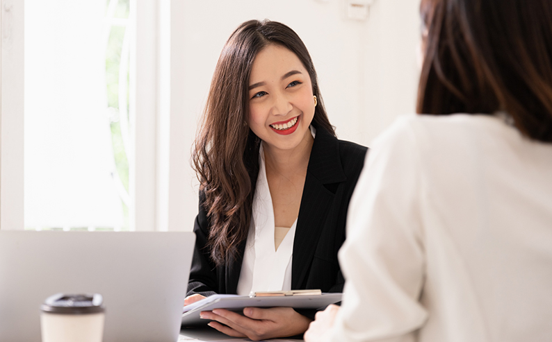 Young Asian woman interviewing