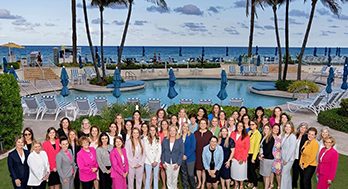 Group of women advisors at a tropical resort.