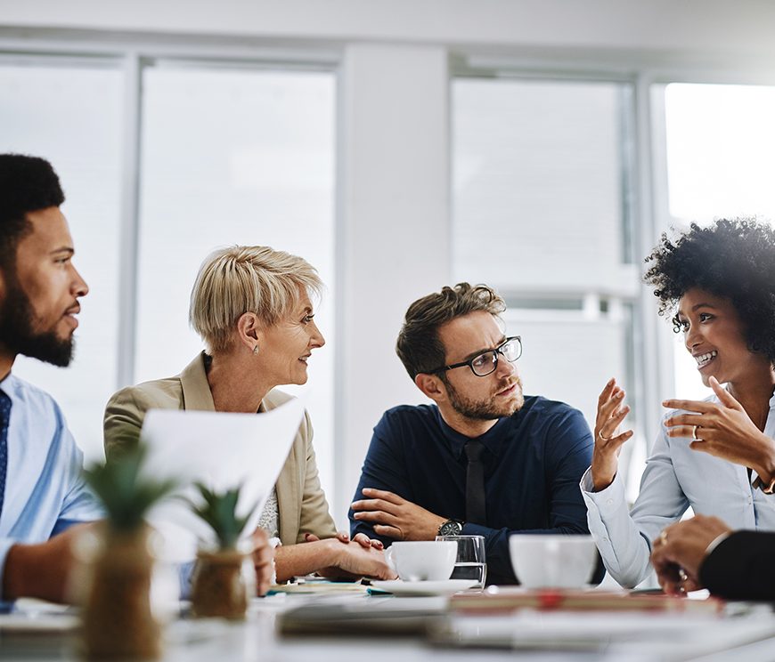 A group of workers having a discussion.